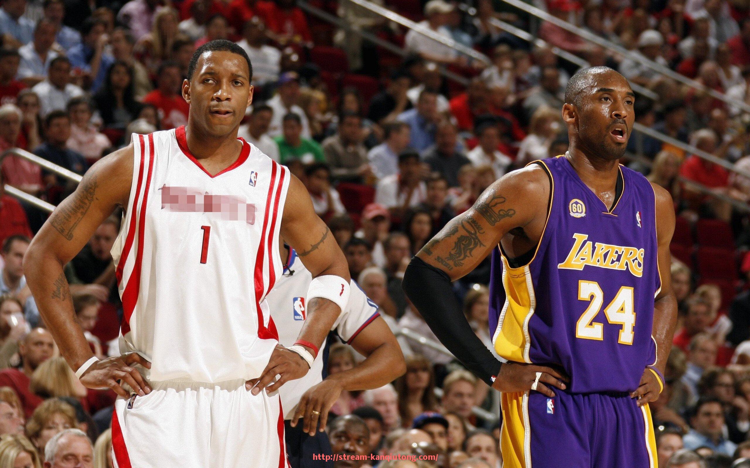 看球通-东契奇与波尔津吉斯的搭档在2022年雄鹿对决中展现哪些协同效应